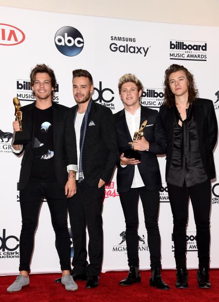 Singers Louis Tomlinson, Liam Payne, Niall Horan, and Harry Styles of One Direction, winners of the Top Duo/Group and Top Touring Artist awards, pose in the press room during the 2015 Billboard Music Awards.