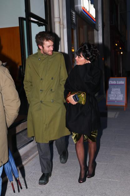 Lily Allen and Jonah Freud making a stylish appearance in Paris.
