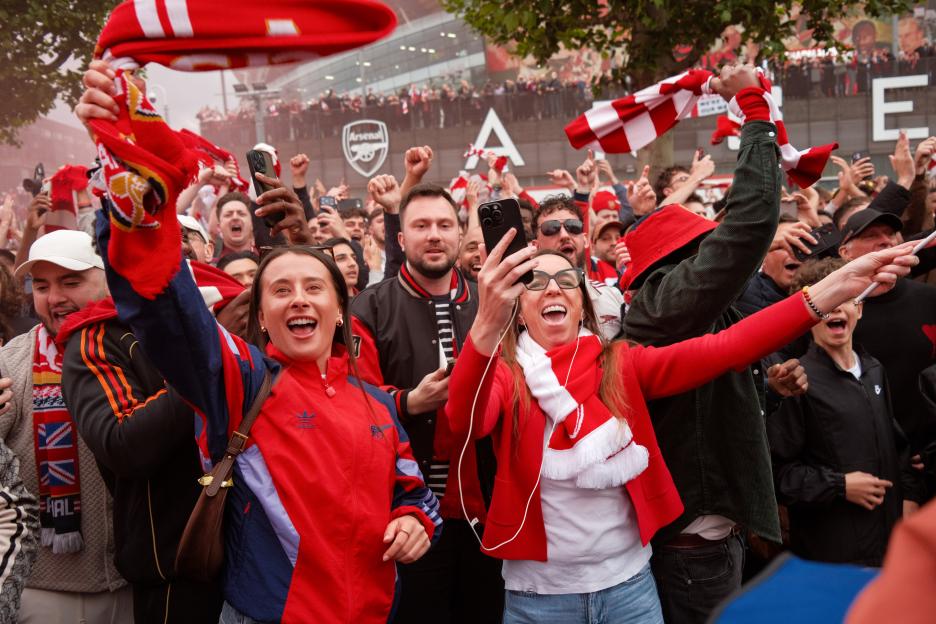 Arsenal fans outside Emirates Stadium during a UEFA Champions League semi-final match.