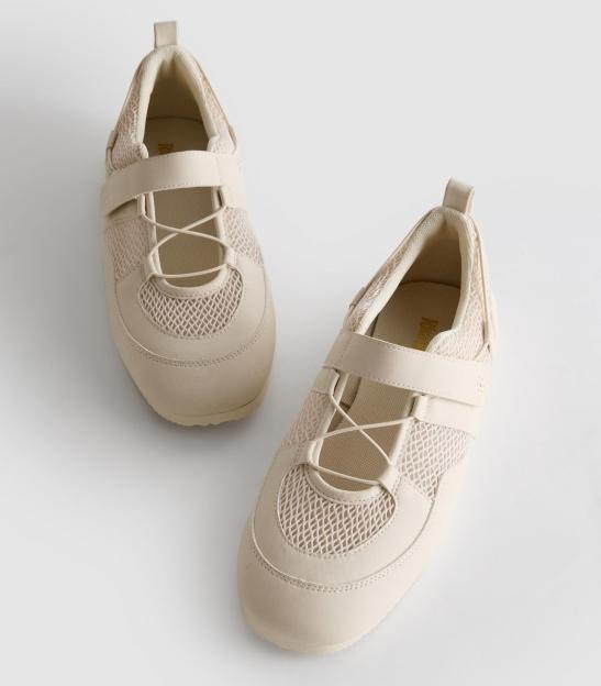 Pair of beige mesh shoes.