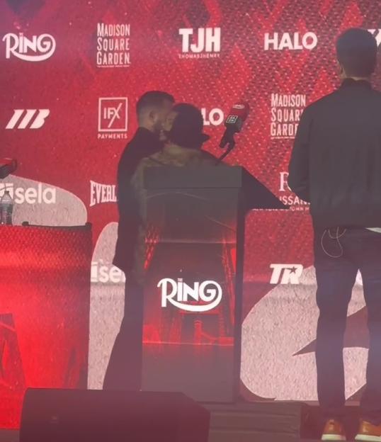 Shakur Stevenson confronting Teofimo Lopez on stage.