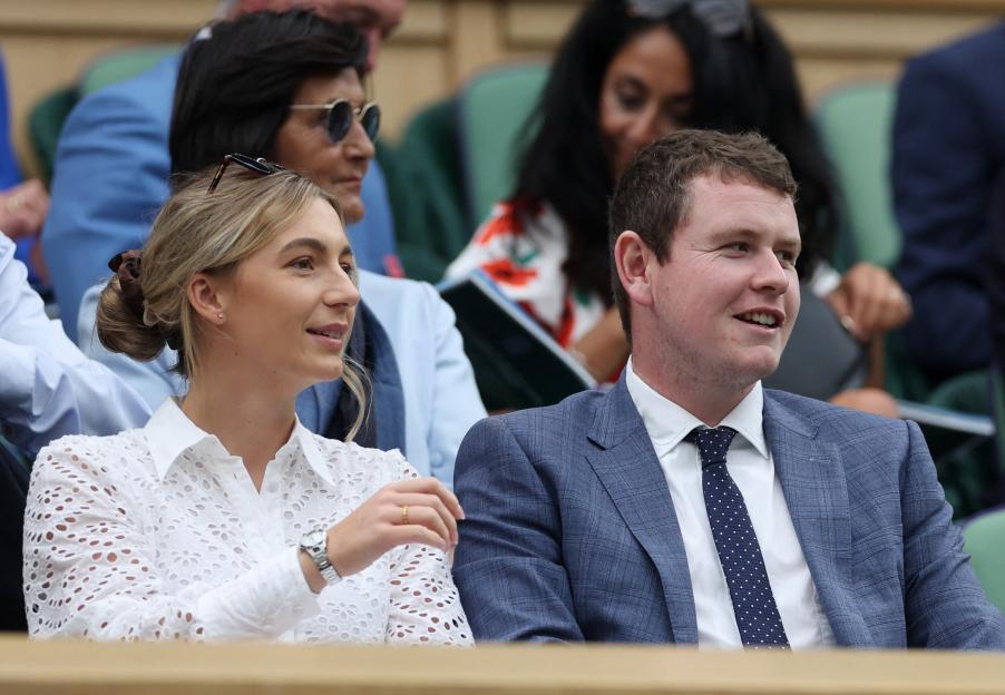 Golfers Robert MacIntyre and Shannon Hartley in the royal box at Wimbledon.