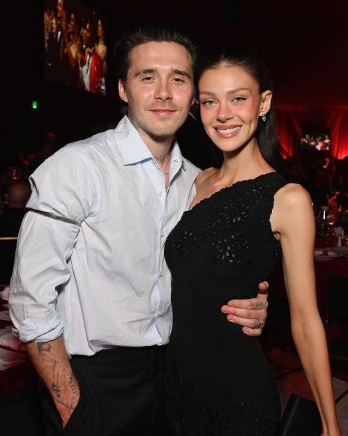 Brooklyn and Nicola Peltz Beckham smiling at the Elton John AIDS Foundation's 34th Annual Academy Awards Viewing Party.