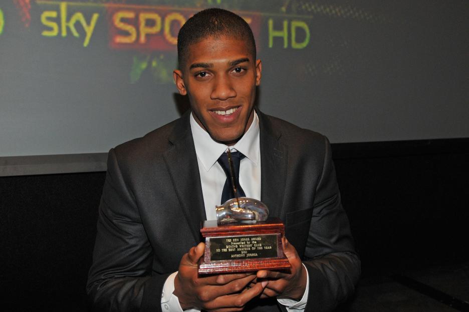 Anthony Joshua holding the Ken Jones Award, presented by the Boxing Writers Club to the Best Amateur of the Year 2011.