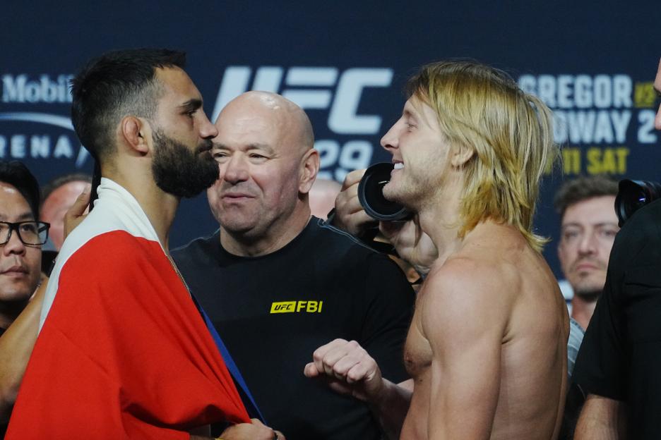 Benois Saint Denis and Paddy Pimblett face off at the UFC 329 ceremonial weigh-ins.