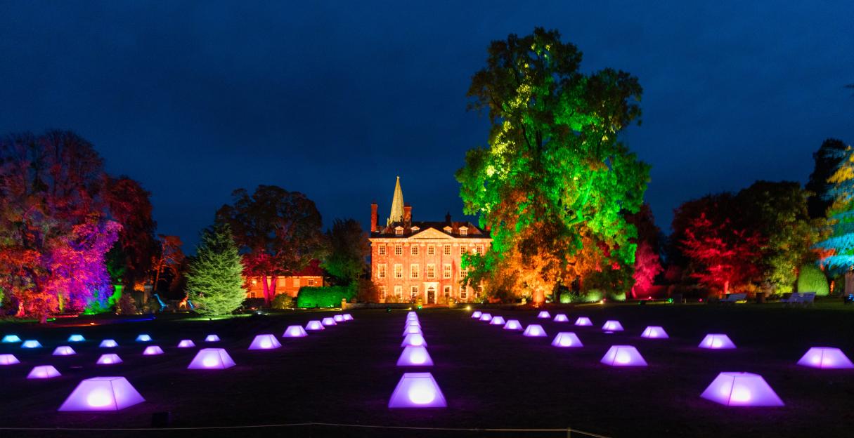 The Welford Park estate illuminated at night with a light display.