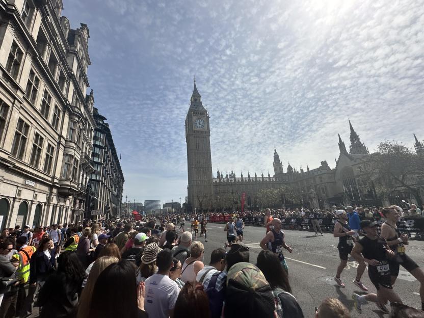 Runners participate in the London Marathon in front of Big Ben and the Houses of Parliament.