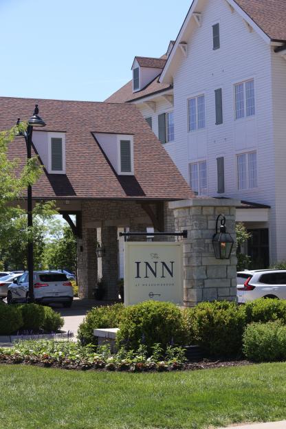 Cars parked outside The Inn at Meadowbrook, a hotel rumored to house the England team for the 2026 FIFA World Cup.