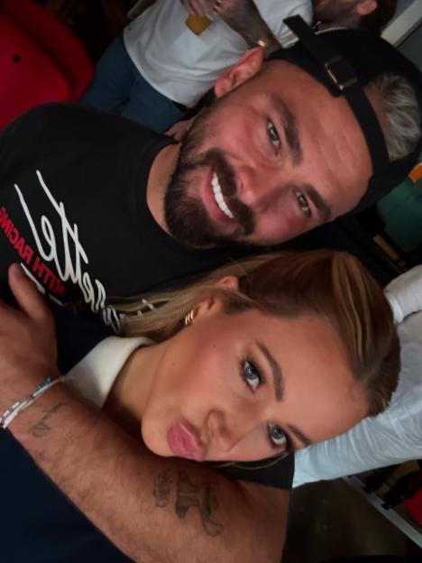 Olivia Attwood with a man smiling in a selfie.