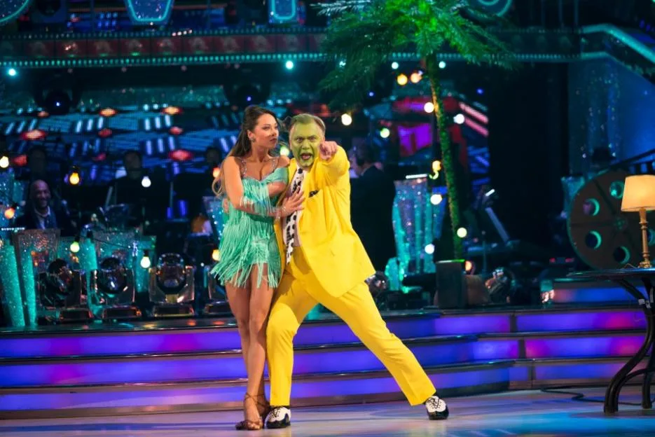 Ed Balls dressed as The Mask and Katya Jones dancing on Strictly Come Dancing.