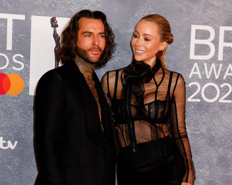 Pete Wicks and Olivia Attwood at The BRIT Awards 2025.