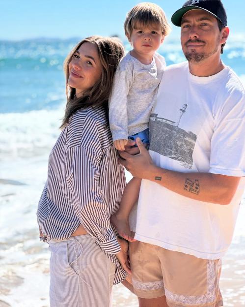 Demi Harman with her family on the beach.