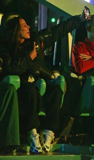 Maya Jama taking a selfie on a ride at Thorpe Park Fright Night with friends.