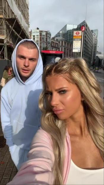 Elsa Rae and Ed Matthews in an outdoor urban setting.