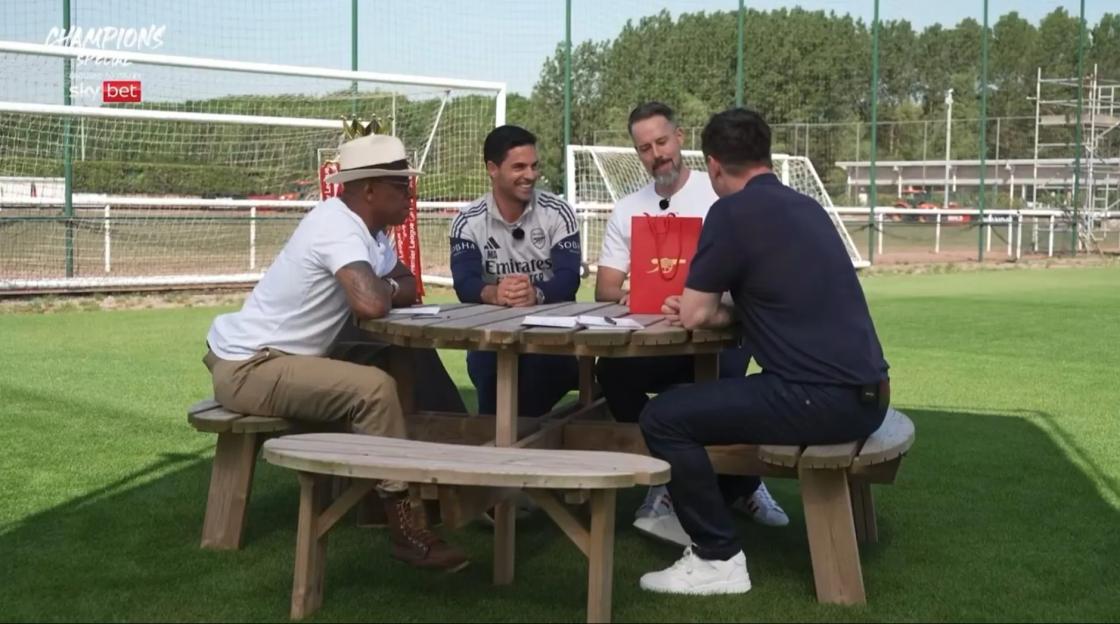 Gary Neville's Delight: Arsenal Chief Surprises Him with Mikel Arteta's Cheeky Gift!