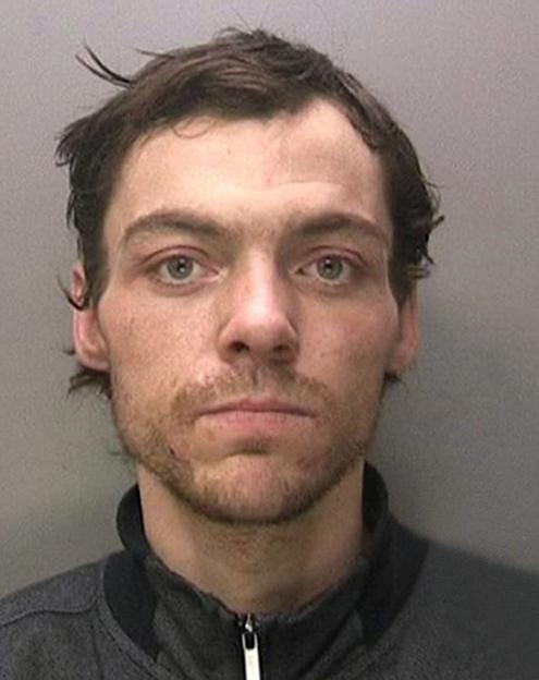 Mugshot of Anthony Russell, a suspect in three Leamington Spa murders.