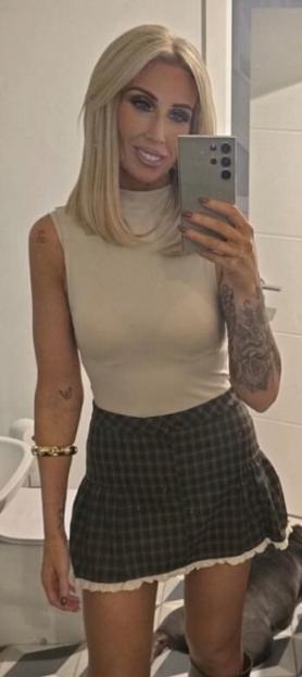 Lynsay Brannan, 39, who has lost significant weight, posing for a photo.