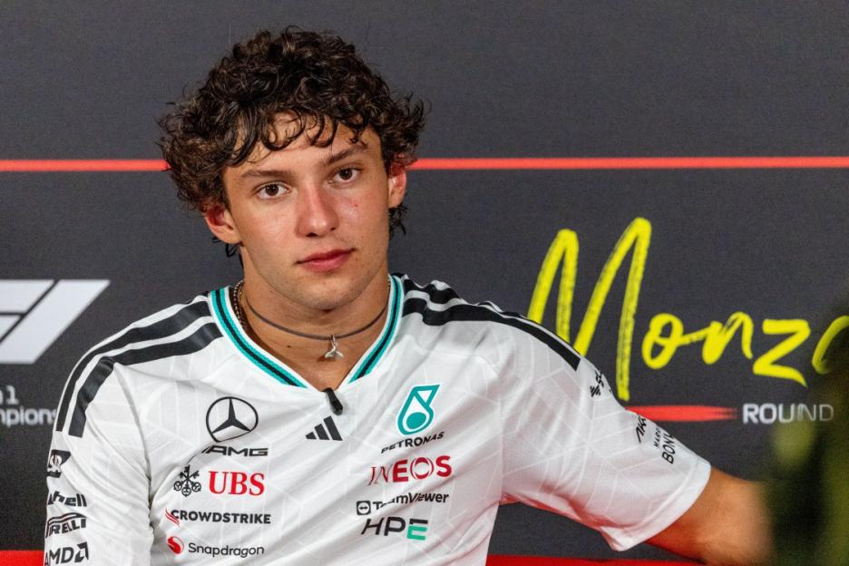 A man in a Mercedes-AMG Petronas Formula 1 Team shirt at the F1 Grand Prix of Italy.