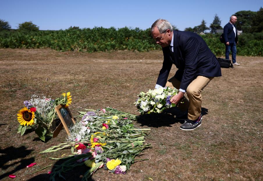 Nigel Farage lays flowers at Dartmoor National Park near the home of Ann Widdecombe.