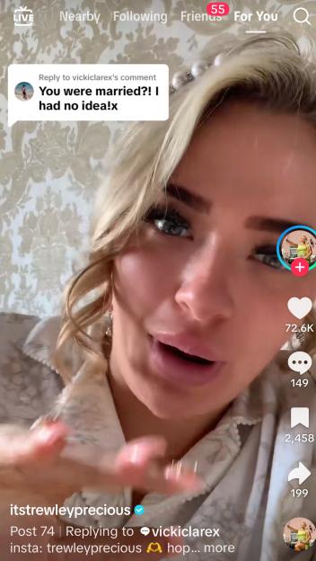 A woman with pearl accents in her hair, appearing on TikTok to answer a comment asking if she was married.
