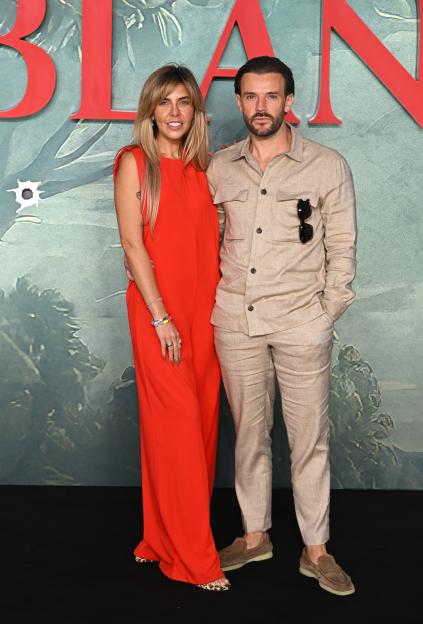 Cara De La Hoyde-Massey and Nathan Massey pose together at the "MobLand" series 2 World Premiere.