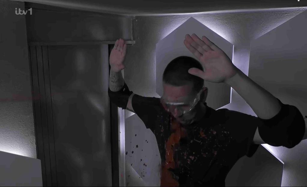 Aitch covered in blood during the "Jungle Doomsday Vault" bush tucker trial.