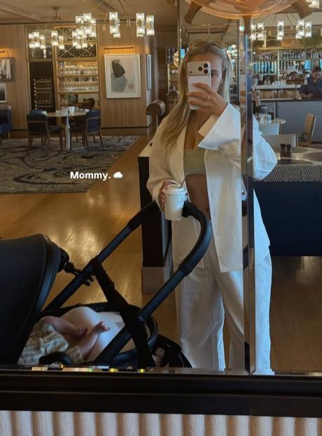 Molly Mae posing in a bikini, six weeks after giving birth, with her baby Midas in a stroller.
