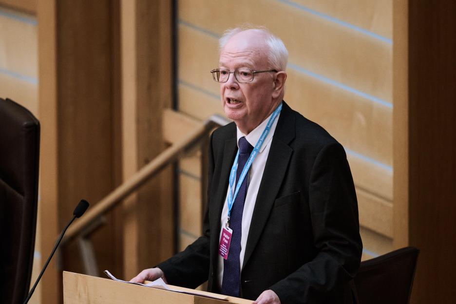 Jim Wallace speaking at the Scottish Parliament in Edinburgh.