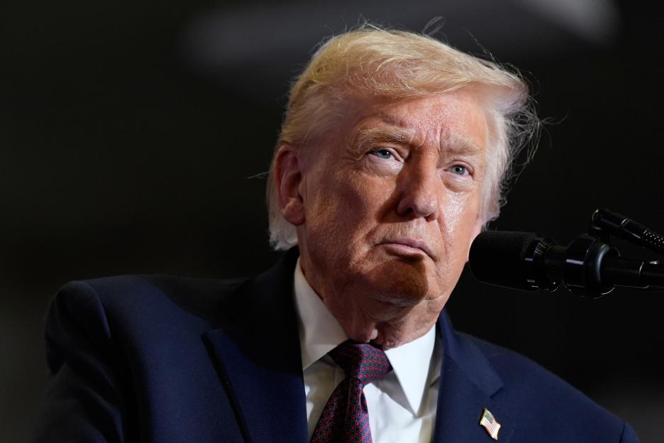 Donald Trump speaking at a campaign event.