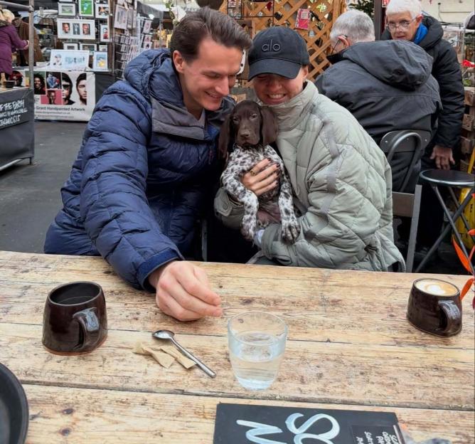 Zoe Ellen Rae with a new dog.