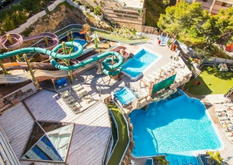 Aerial view of Magic Aqua Rock Gardens with water slides and pools.