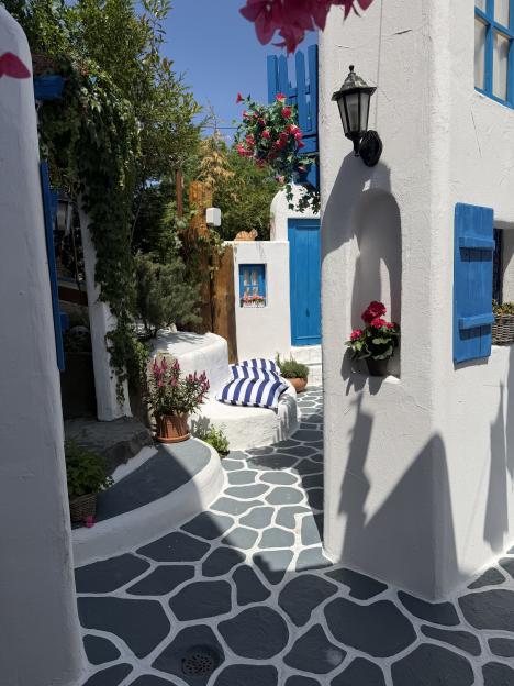 We made a mini Greek village in our garden - fitted with a bar