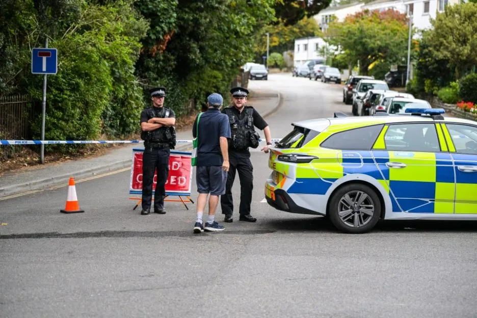 Police managing a roadblock near Falmouth Docks.
