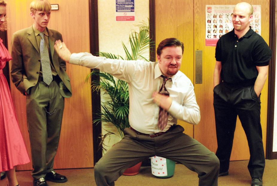 Ricky Gervais as David Brent performing his dance routine from "The Office."