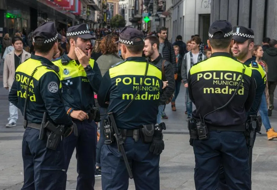 Municipal Police on duty in the Puerta del Sol, Madrid, Spain