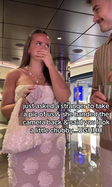Spencer Barbosa covering her mouth in shock while a man smiles at her, with text on screen describing a stranger's fat-shaming comment.