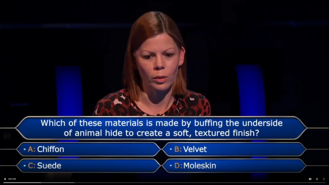 A woman on "Who Wants To Be A Millionaire" considers a multiple-choice question: "Which of these materials is made by buffing the underside of animal hide to create a soft, textured finish?" The options are A: Chiffon, B: Velvet, C: Suede, D: Moleskin.