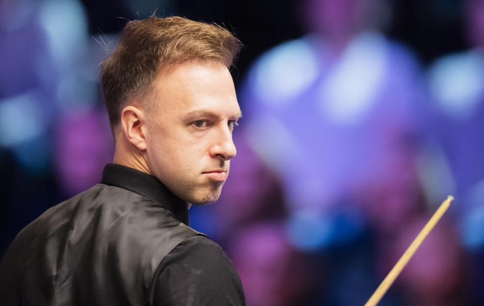 Judd Trump looking over his shoulder during the 2025 Victorian Plumbing UK Championship.