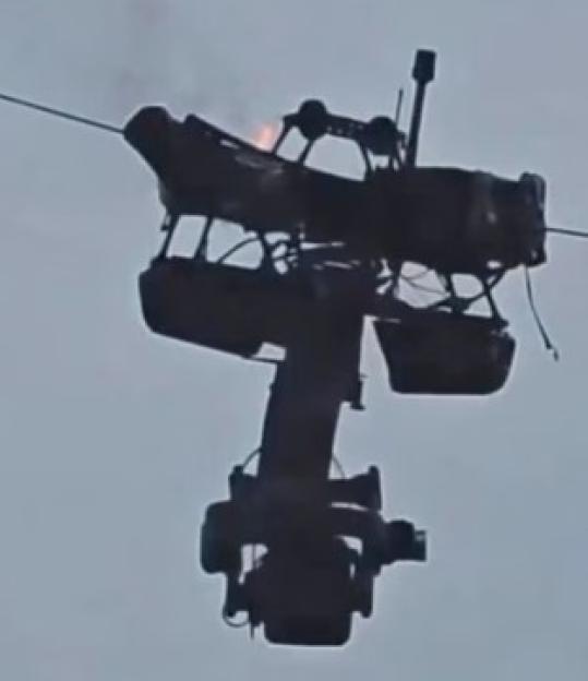 Shocking Incident: Giant Camera Plummets onto Pitch, Just Misses Confused Operator!
