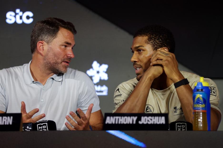 Anthony Joshua and Eddie Hearn at a press conference.