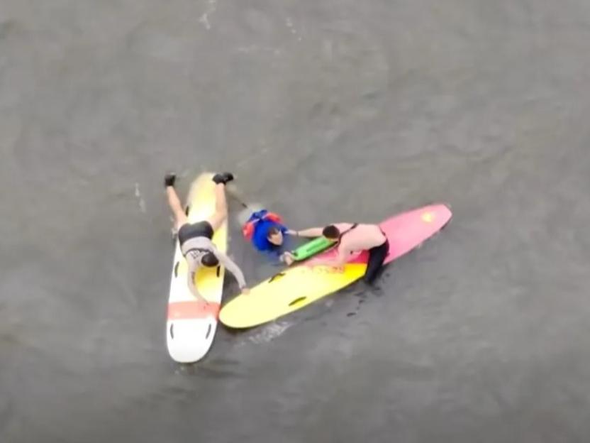 Police Pursue Fleeing Suspect on Paddleboards as He Jumps into River and Swims to Freedom