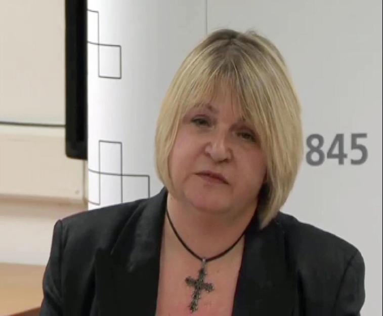 Sylvia Lancaster speaking at a news conference.