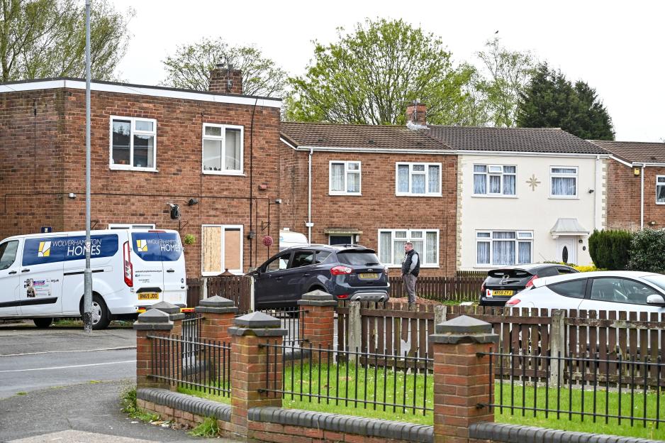 Woman, aged in her 70s, dies after being attacked by two dogs at house