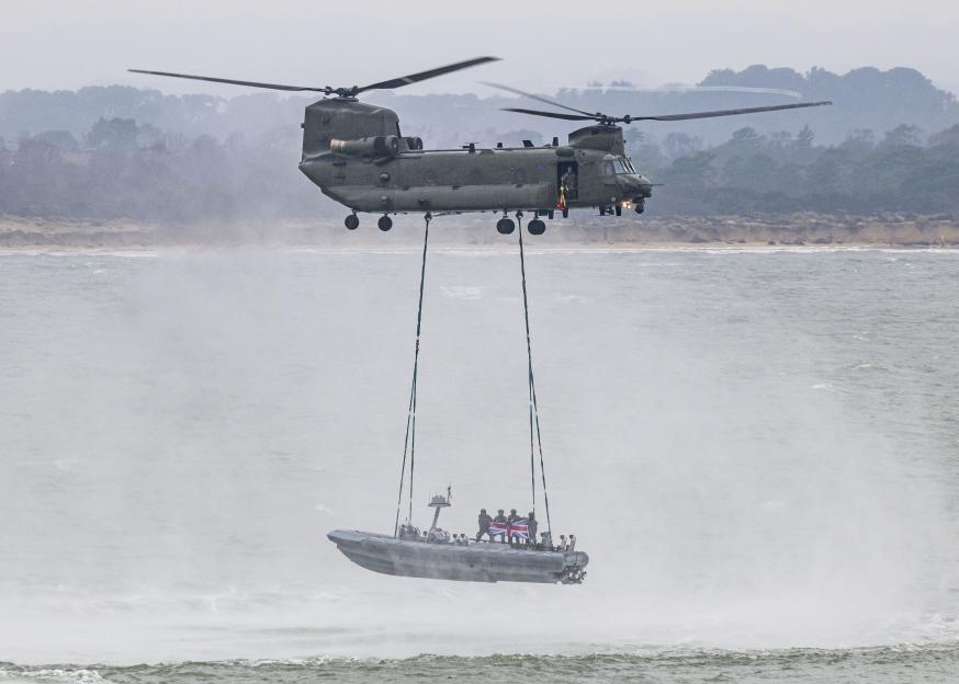 'Special Forces Dazzle in Channel Training Exercise, Attaching Speedboat to Chinook'