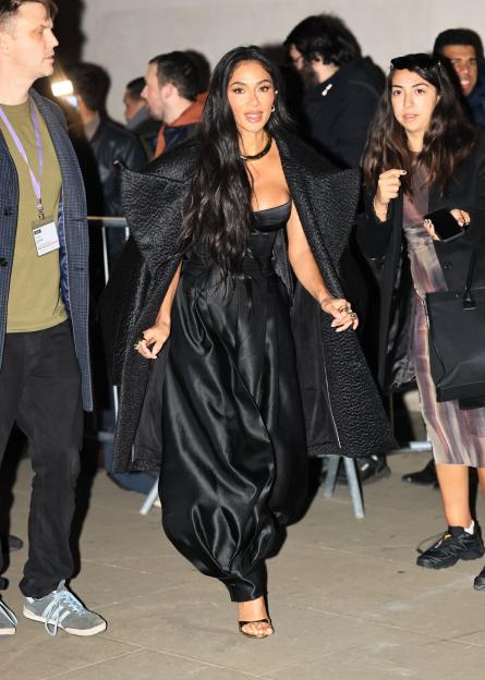 Pussycat Dolls Nicole Scherzinger took centre stage making a busty appearance stepping out of the one show with Kimberley Wyatt and Ashley Roberts after their first performance as a trio