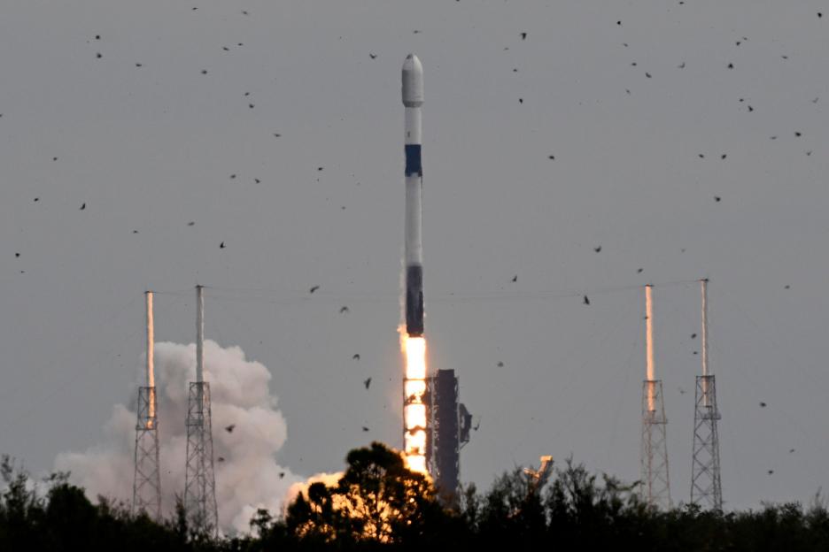 With a record breaking turnaround time of 45 hours on Pad 40, a SpaceX Falcon 9 rocket launches 29 Starlink satellites into hazy and humid skies at 1:08 PM from Launch Complex 40 on Mission 6-98 at the Cape Canaveral Space Force Station, Florida on W