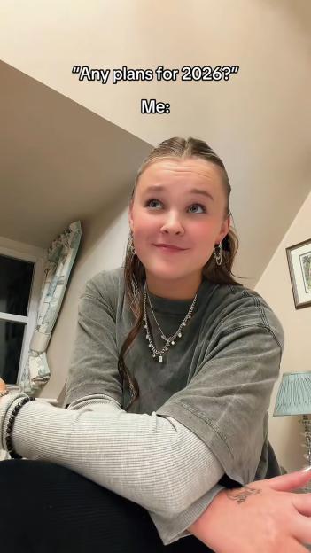 JoJo Siwa looks up with a slight smile with the text "Any plans for 2026?" and "Me:"
