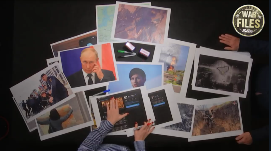 Collage of images laid on a table, including a portrait of Vladimir Putin, images of protests, social media posts, and war scenes.