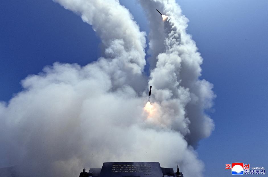 North Korean leader Kim Jong Un observes a cruise missile launch
