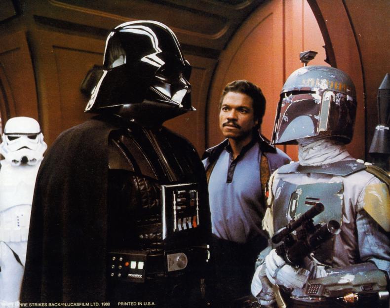 Darth Vader, Lando Calrissian, and Boba Fett in a scene from Star Wars: Episode V - The Empire Strikes Back.